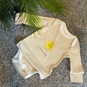 Cream Long Sleeve Baby Onesie with Sun Design